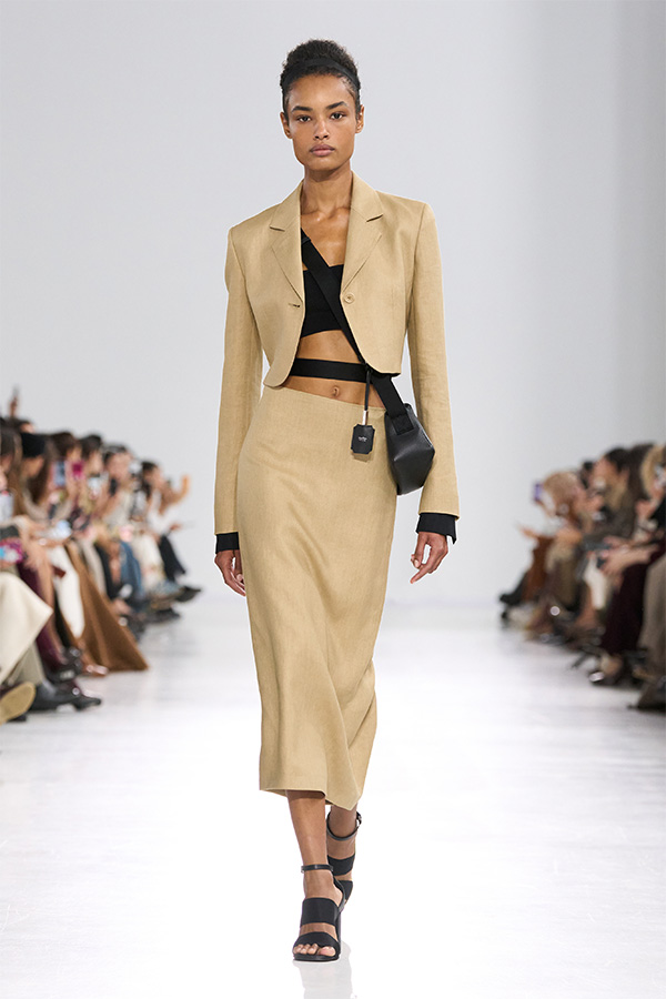Max Mara Spring/Summer 2026 Fashion Show - Beige Look with blazer, skirt and black crossbody bag.